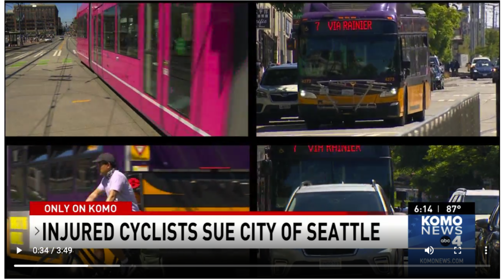 Image of KOMO News story about injured bicyclists suing Seattle for unsafe road. S. Jackson